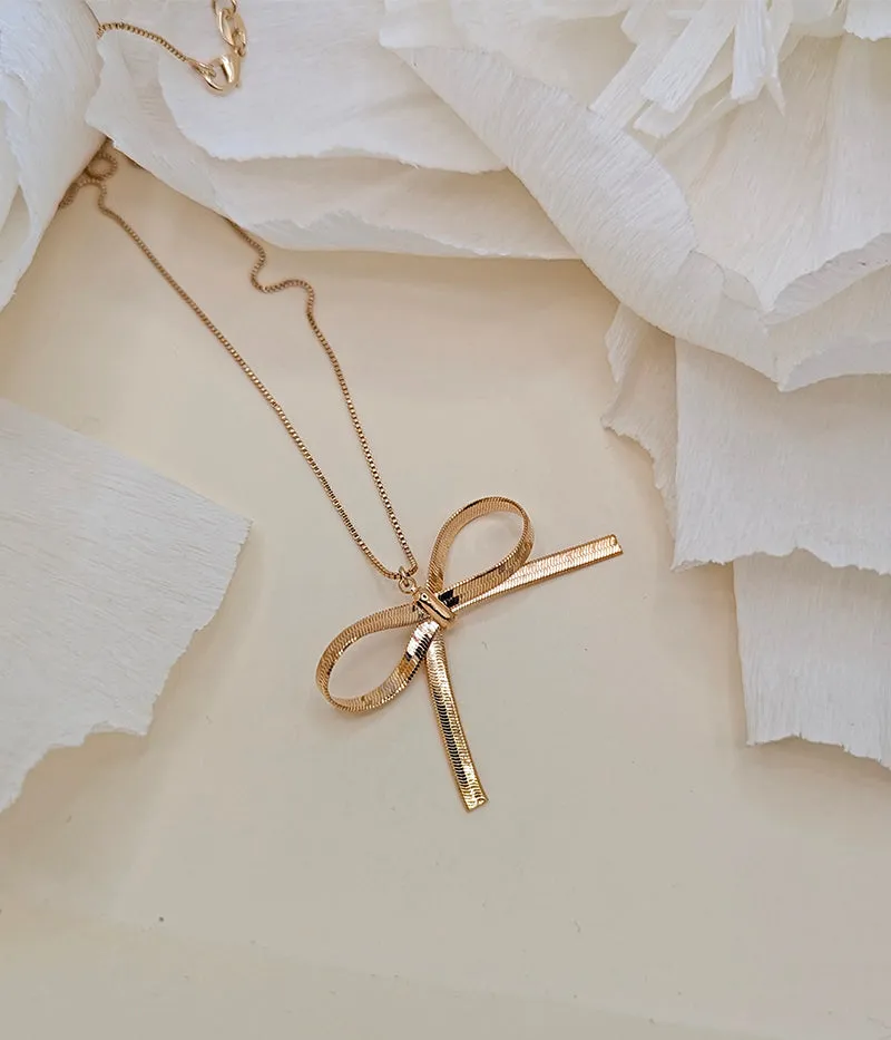 Nuance Bow Pendant Necklace